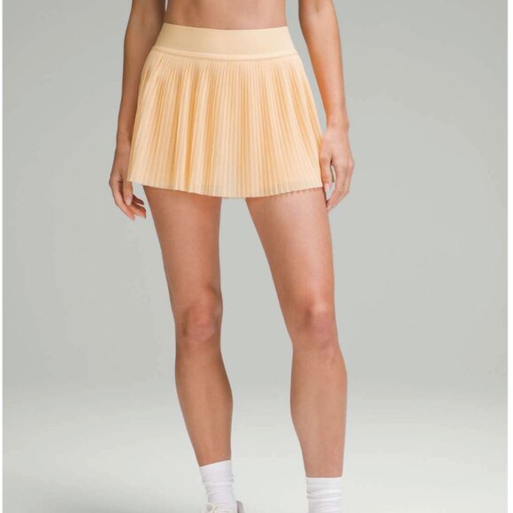 lululemon athletica Dresses & Skirts - Lululemon Mesh Pleats Mid-Rise Mini Tennis Skirt, Summer Glow Size 4